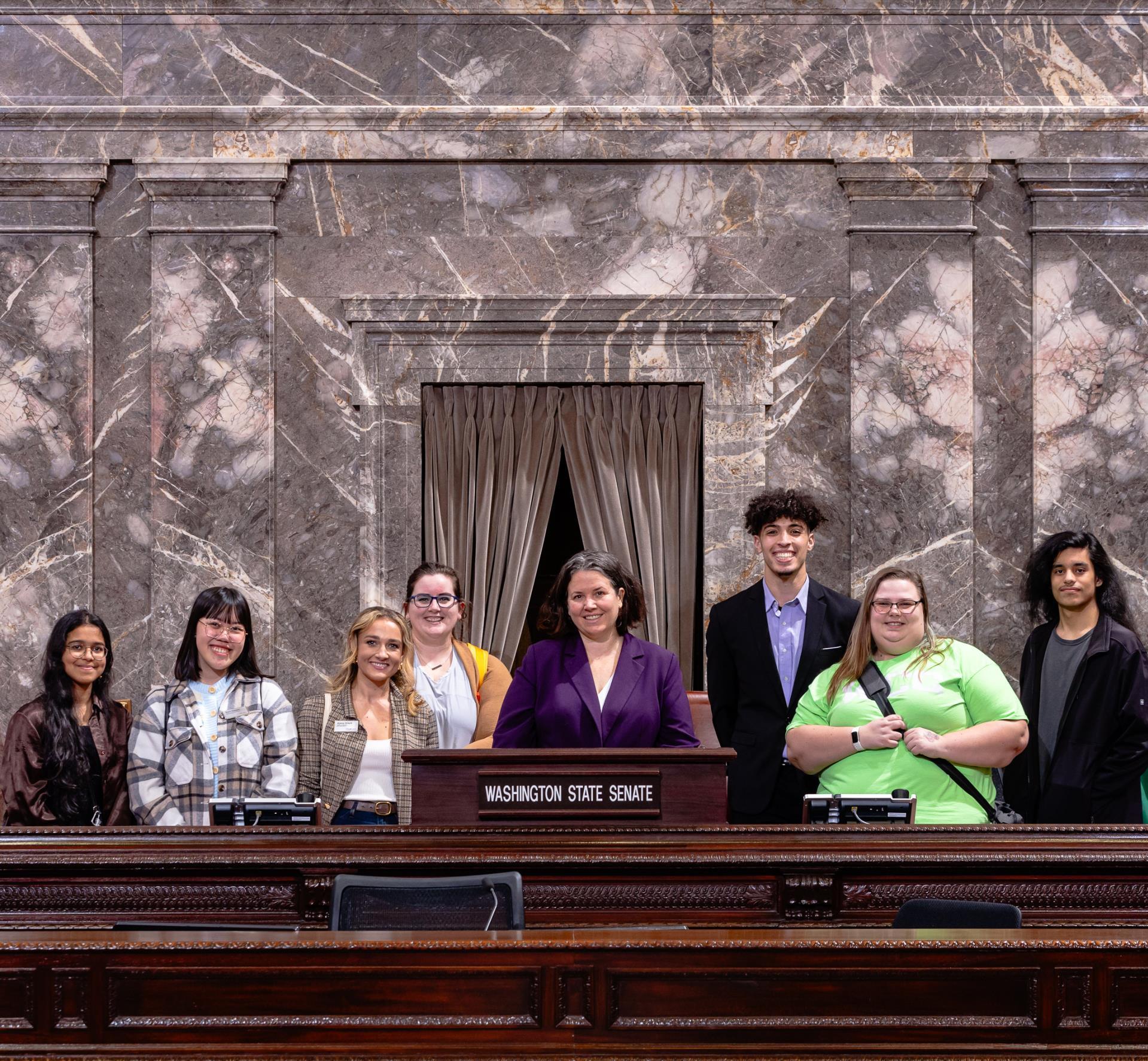 An image of student leaders with Sharon Shewmake at the state Capitol