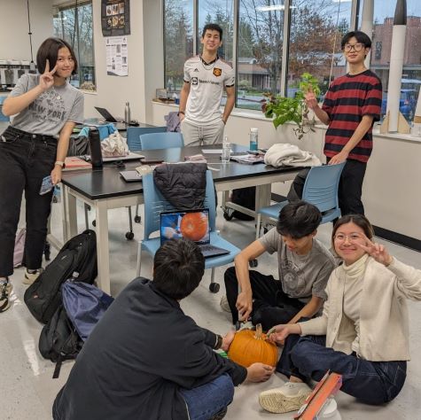 Engineering in Context students carve a pumpkin for the Haunted STEM Lab